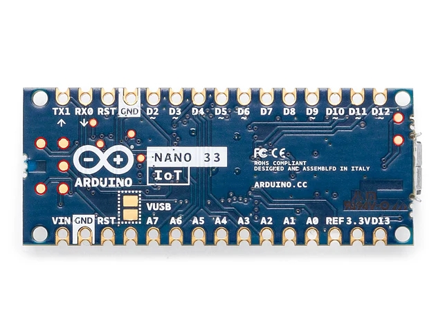 The back face of an Arduino Nano 33 IoT with the test pads circled in red